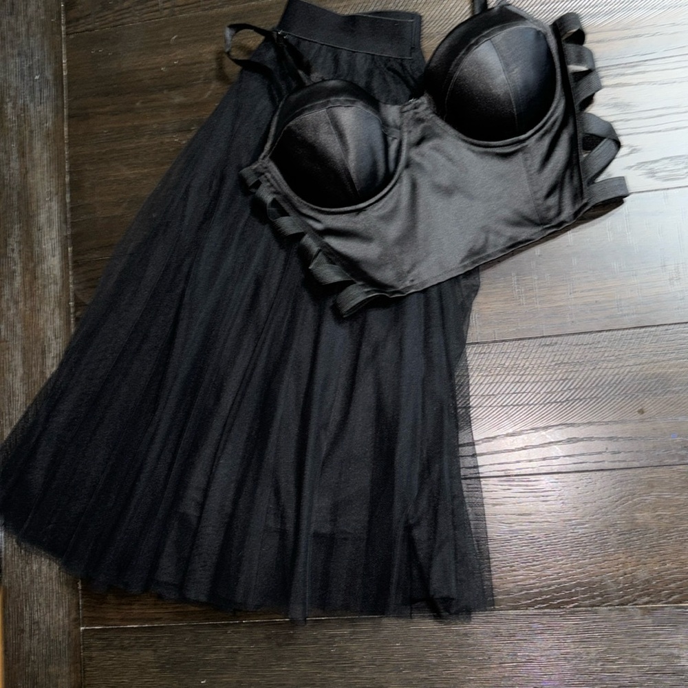Medium corset top and small tulle skirt.